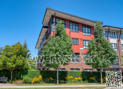 New residential apartment building on blue sky background