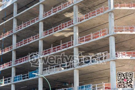 Facade of high-rise concrete building under constraction