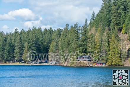 Lake overview with camp ground and water front residential house