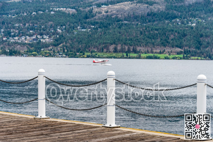 Hydro airplane preparing to take off Okanagan lake surface