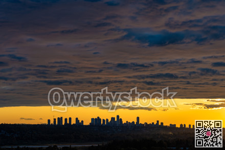 Urban cityscape silouette on sunset sky background