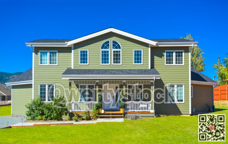 Big family house with pathway to the door in front and blue sky background