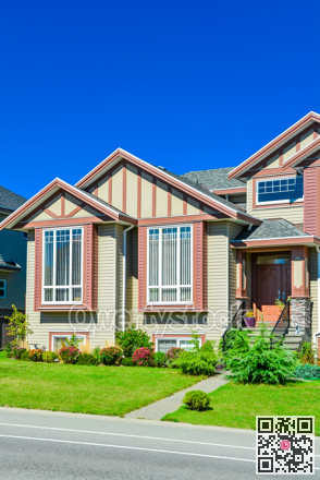 Main entrance of big family house with concrete door steps in front