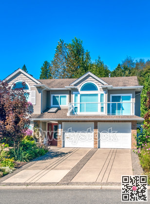 Big residential house with double garage and concrete drive way