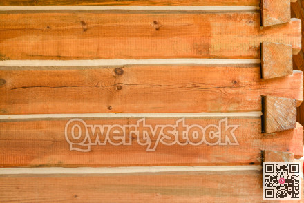Corner of a house built with timber bars