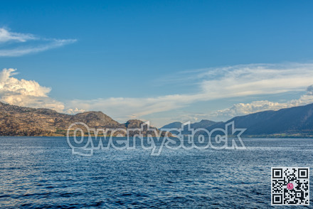 Scenery view of rocky slope over the lake in British Columbia