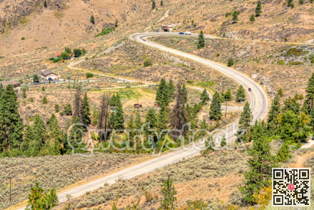 S-shaped road in Rocky mountains on summer day