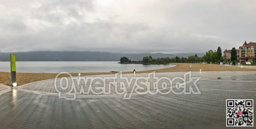 Panoramic view of the beach in Kelowna on overcast rainy day