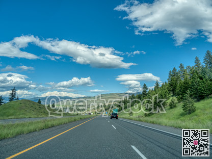 Four lane highway one on bright summer day