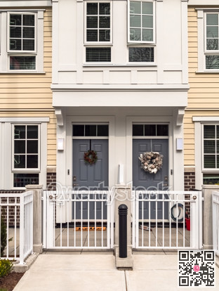 Entrance doors of brand new residential townhouses