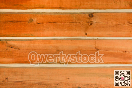 Wall of a house built with timber bars