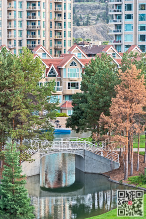 Facades of residential apartment buildings with water channel in front