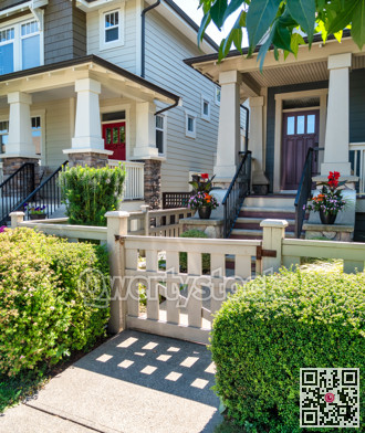 Porch and entrance of a nice residential house with two flower pots