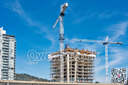 Residential building under constraction on blue sky background