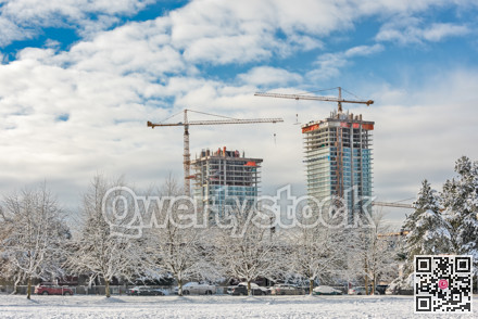 A new build of high-rise residential building on bright winter day