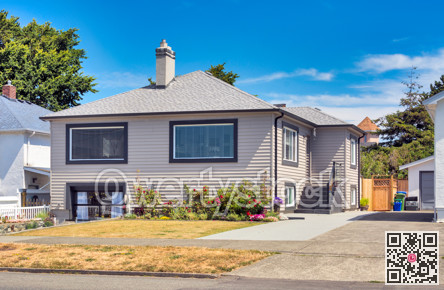 Average residential house on bright summer day