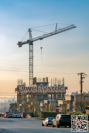 New high-rise building under construction on winter morning