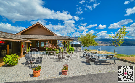 Vacant outdoor cafe on high shore of Okanagan lake