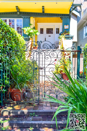 Decorated gate in front of residential house entrance