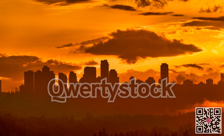 Urban cityscape silhouette on sunset sky background