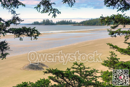 Tidal rise on Pacific ocean long beach near Tofino, British Columbia, Canada