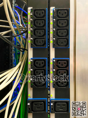 Power sockets on power bar mounted on side of data equipment rack